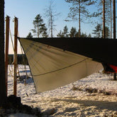 Bushmen Thermo Tarp 4×3 in an outdoor setting, showcasing its water-resistant and insulating features.